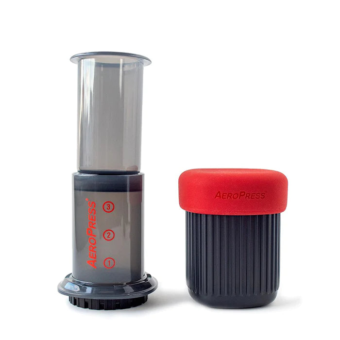 AeroPress Go and mug on white background