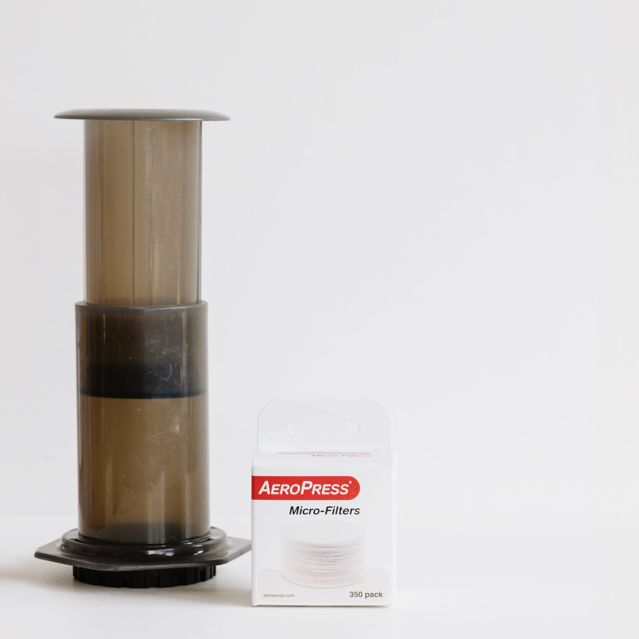 AeroPress filters on white background