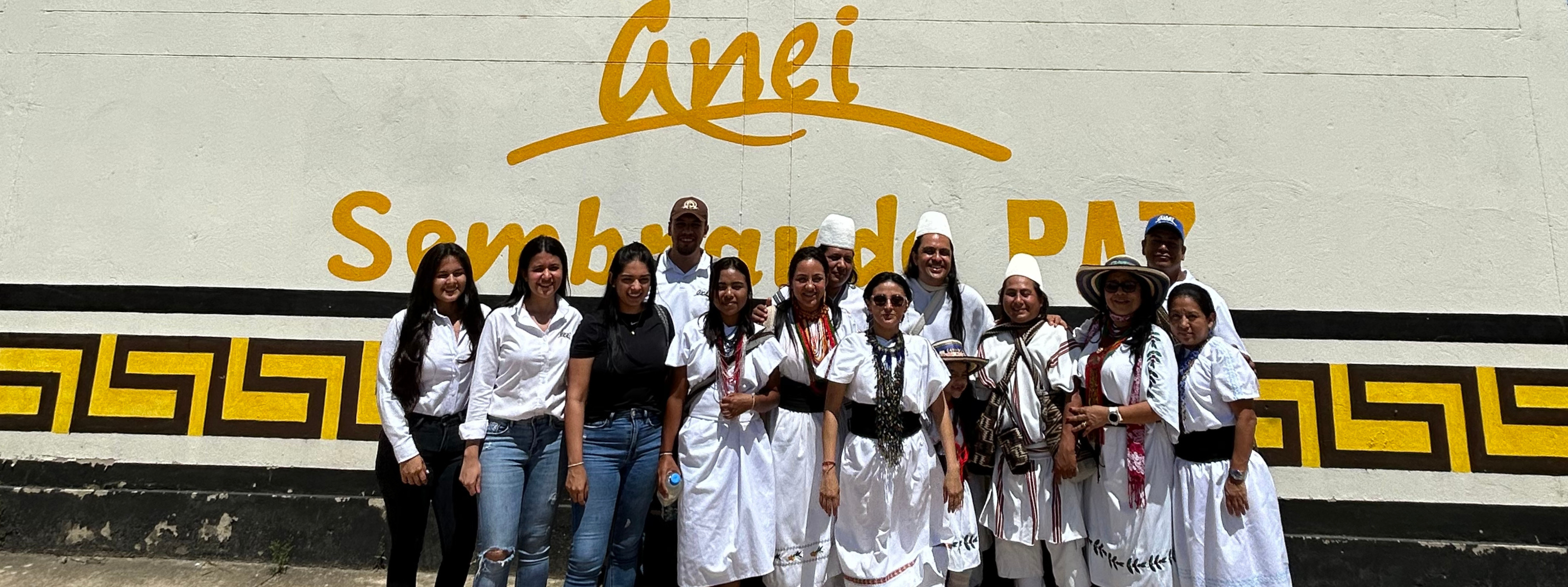 anei coffee mural with people in front