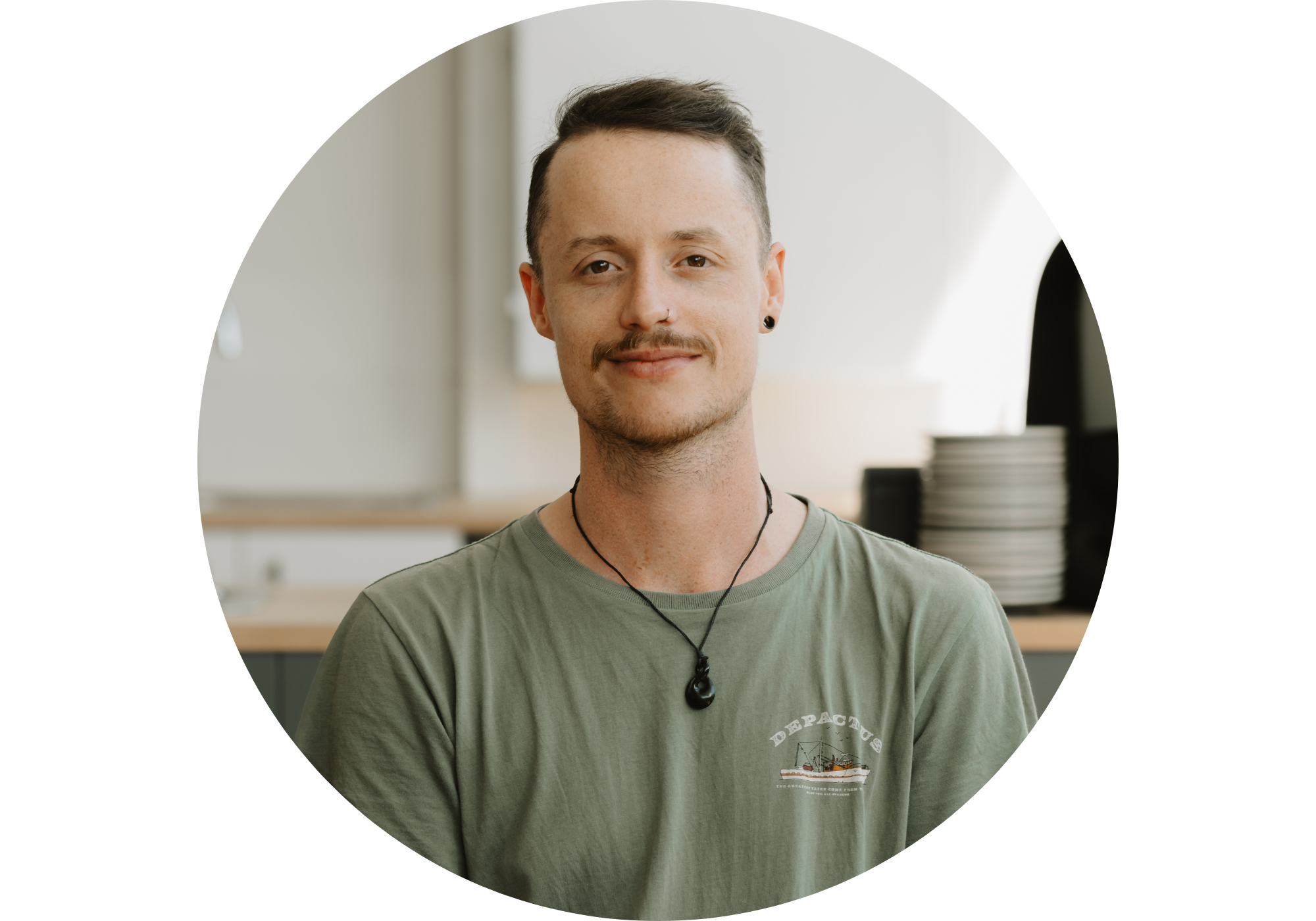 man in front of espresso machine