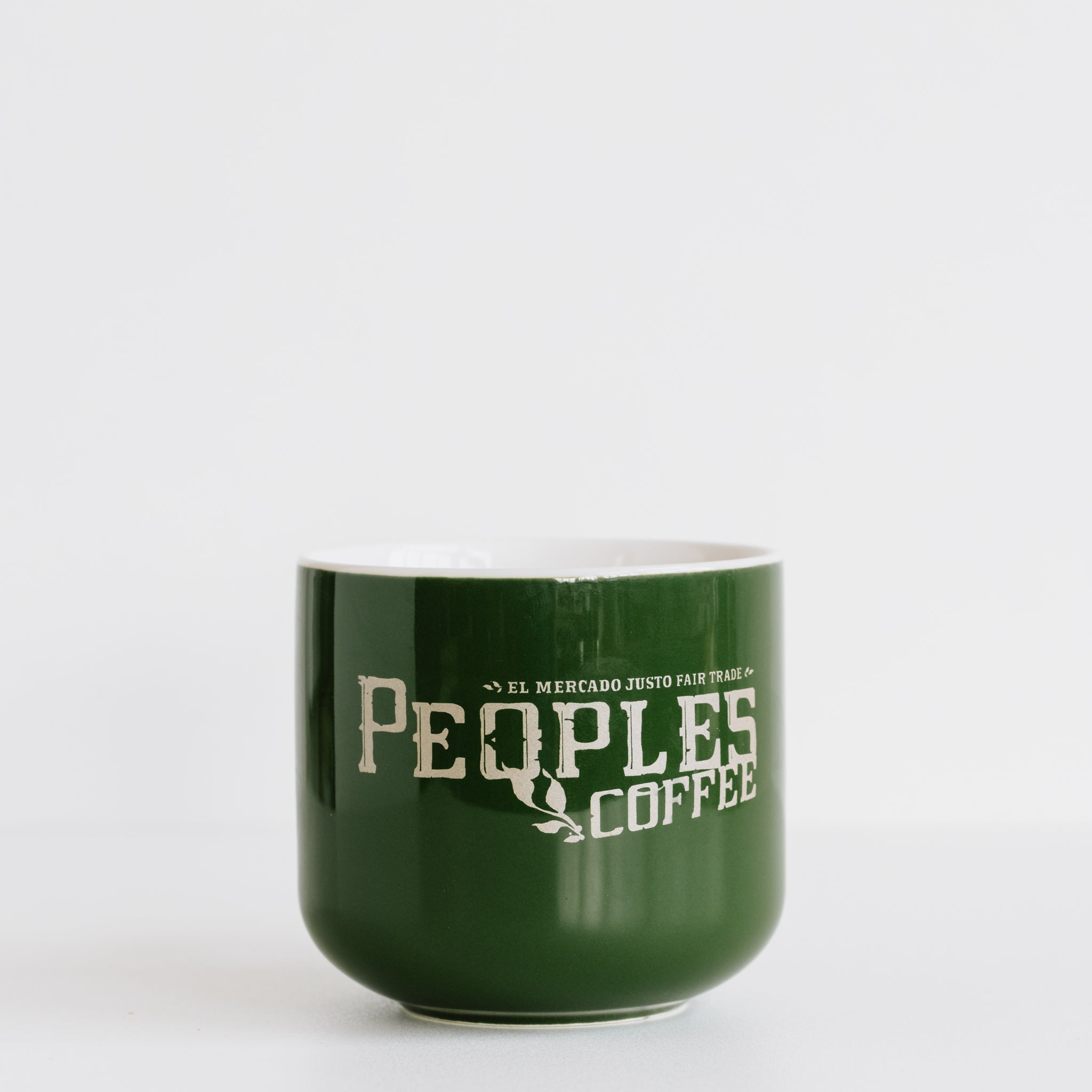 green peoples coffee mug on white background