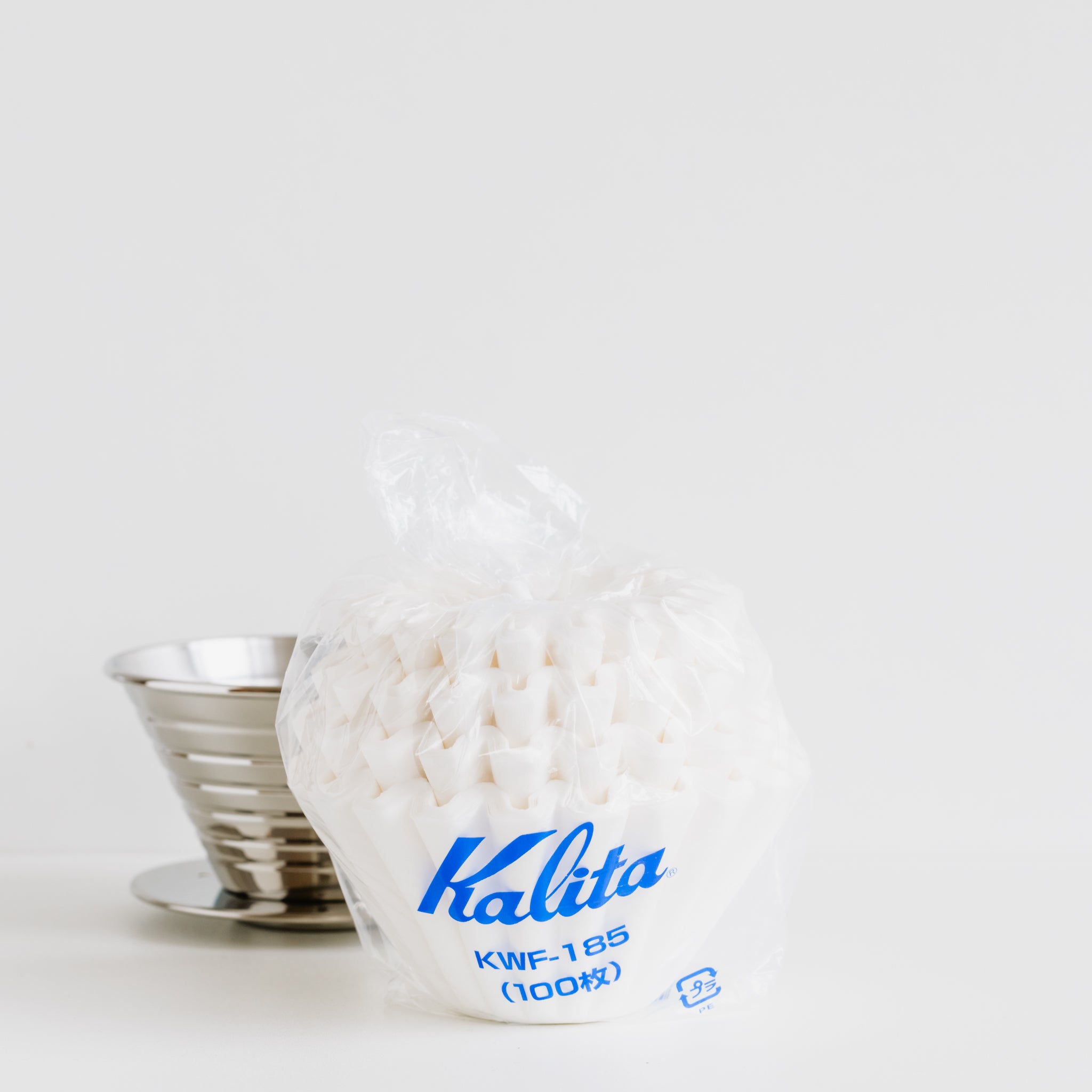 Kalita wave 185 filters with dripper on white background